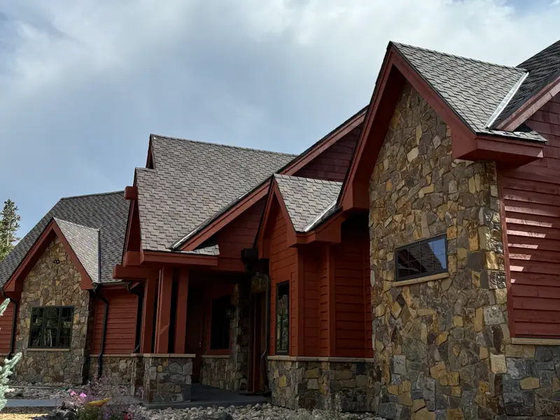 Side elevation of a red-stained mountain home