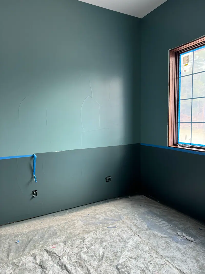 Interior room painted a deep teal