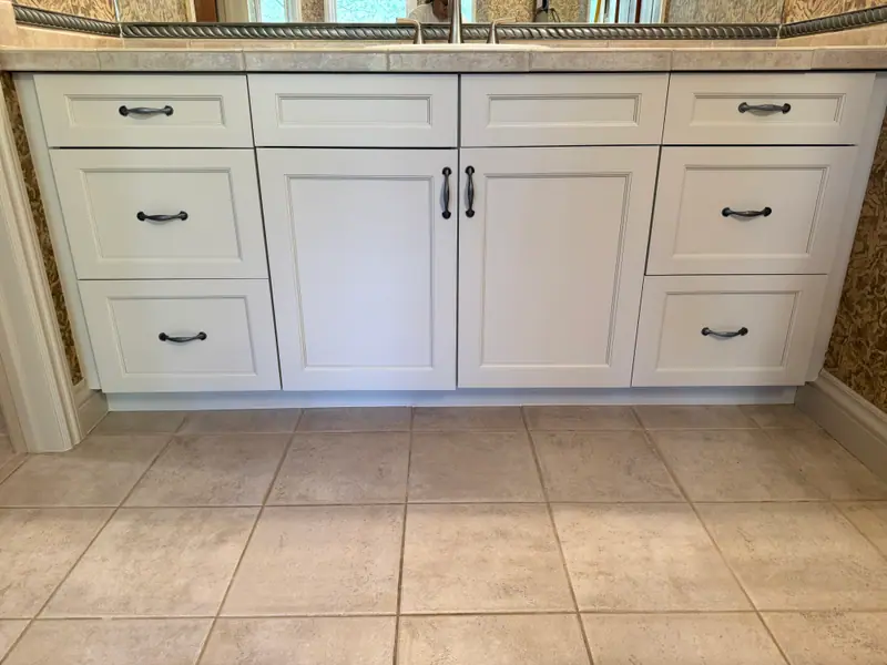 Bathroom vanity refinished in white
